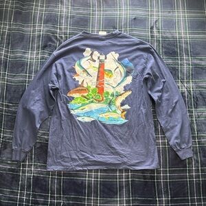Guy Harvey Navy blue long sleeve shirt with pocket and back graphic.